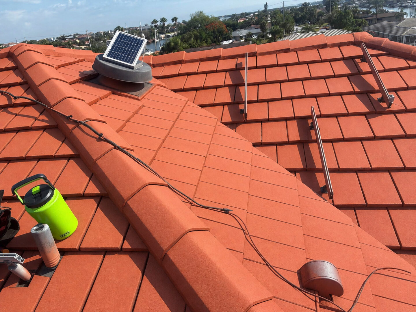 new-terracotta-tile-roof-with-solar-vent